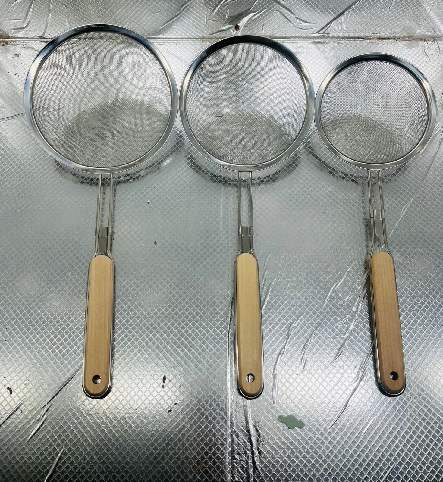 STAINLESS STEEL JUICE AND PAKORA STRAINER WITH WOODEN HANDLE